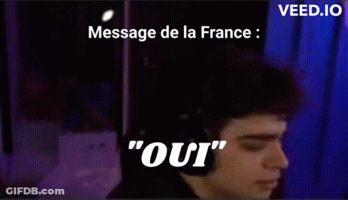 A Man Wearing Headphones Says " Oui " In Front Of A Purple Background GIF