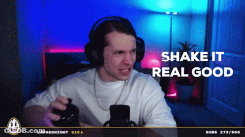 A Man Wearing Headphones Says Shake It Real Good In A Video GIF