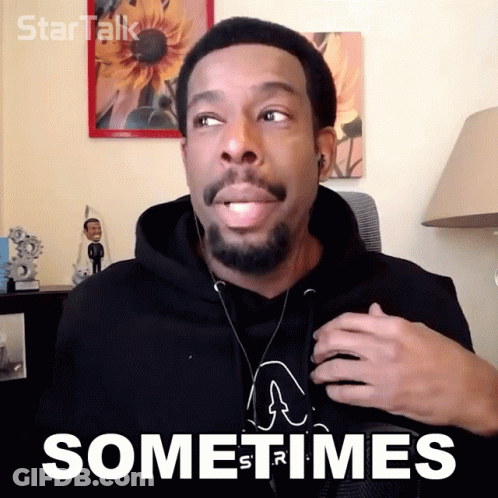 A Man Wearing Headphones Says " Sometimes " In Front Of A Picture Of A Sunflower GIF