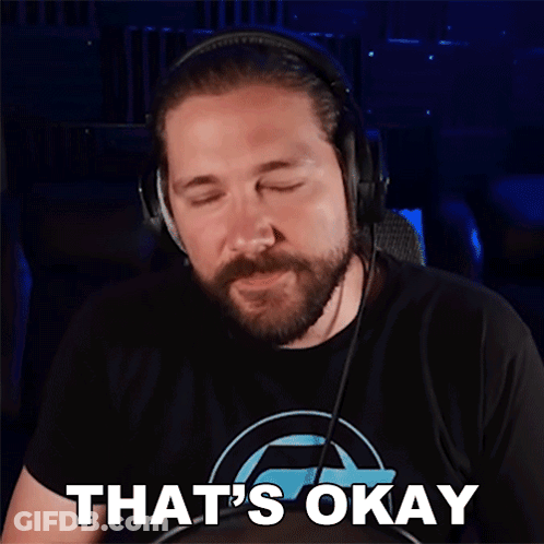 A Man Wearing Headphones Says That 'S Okay In Front Of A Microphone GIF
