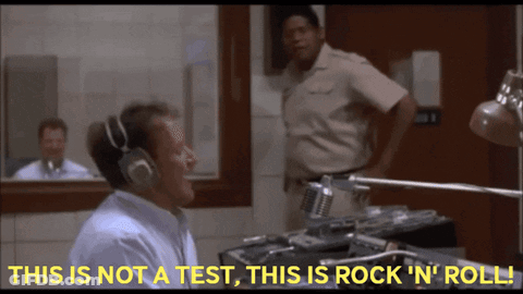 A Man Wearing Headphones Says " This Is Not A Test This Is Rock ' N ' Roll " GIF