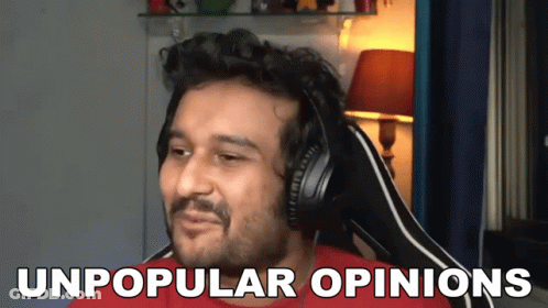 A Man Wearing Headphones Says " Unpopular Opinions " In Front Of Him GIF