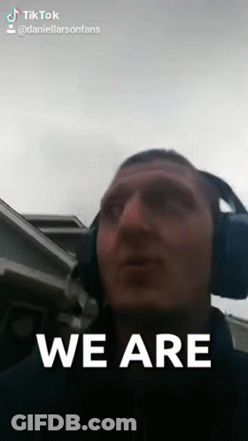 A Man Wearing Headphones Says We Are On A Tik Tok Video GIF