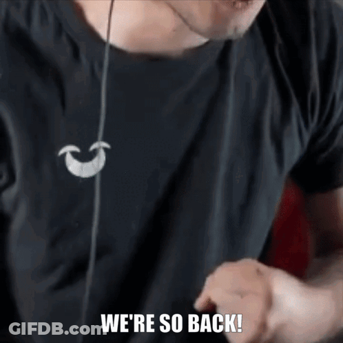 A Man Wearing Headphones Says We Are So Back . GIF
