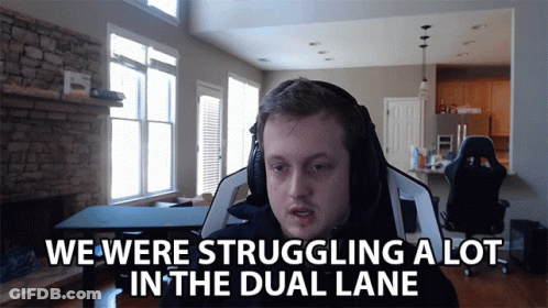 A Man Wearing Headphones Says We Were Struggling In The Dual Lane GIF