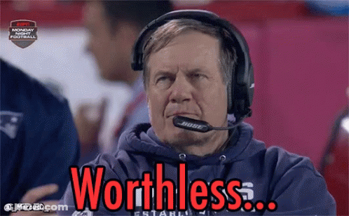 A Man Wearing Headphones Says Worthless In Red GIF
