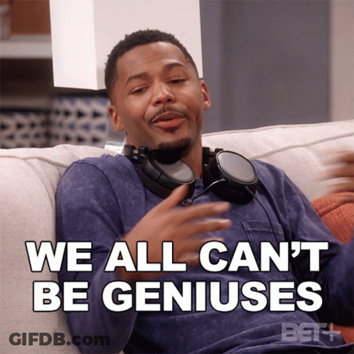 A Man Wearing Headphones Sitting On A Couch With The Words We All Can 'T Be Geniuses Below Him GIF