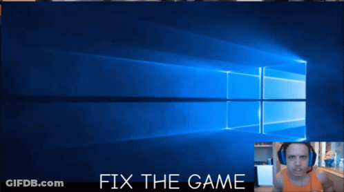 A Man Wearing Headphones Stands In Front Of A Blue Windows Screen With The Words Fix The Game Below Him GIF