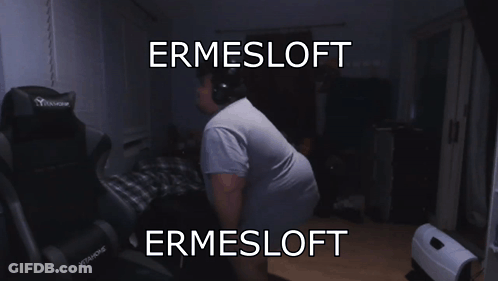 A Man Wearing Headphones Stands In Front Of A Chair That Says Ermesloft On It GIF