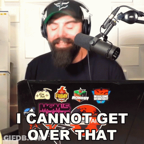 A Man Wearing Headphones Stands In Front Of A Laptop That Says I Cannot Get Over That On It GIF