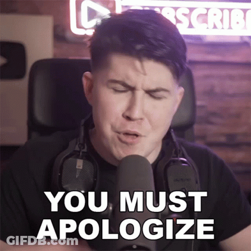 Man With Headphones Saying You Must Apologize GIF