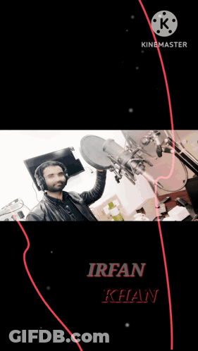 A Man Wearing Headphones Stands In Front Of A Microphone With The Name Irfan Khan Written On The Bottom GIF