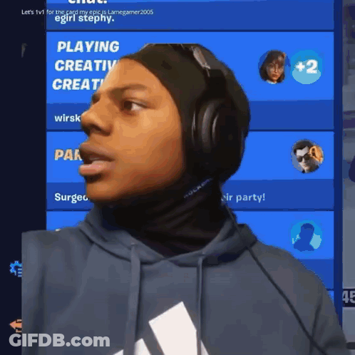 A Man Wearing Headphones Stands In Front Of A Screen That Says Playing Creative GIF