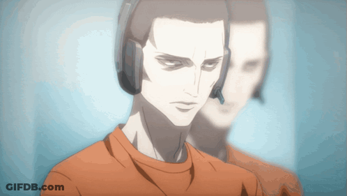 A Man Wearing Headphones Stands In Front Of A Wall GIF