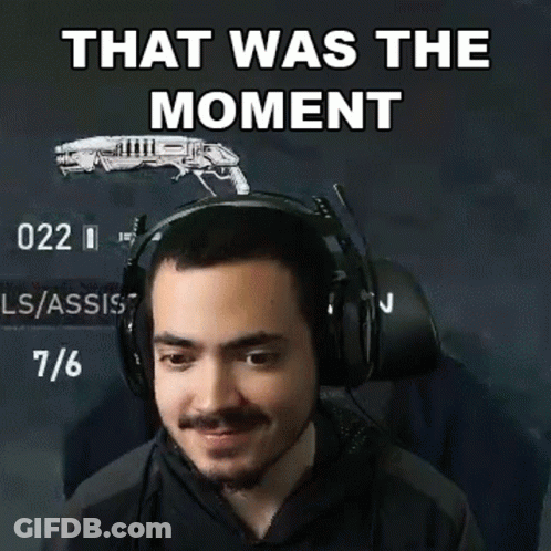 A Man Wearing Headphones With A Gun In The Background And The Words That Was The Moment GIF