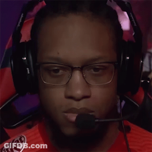 A Man Wearing Headphones With A Kitkat Logo On His Shirt GIF