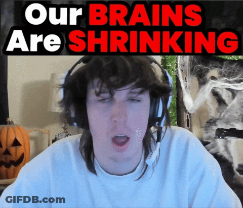 A Man Wearing Headphones With A Sign That Says Our Brains Are Shrinking GIF
