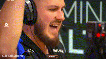 A Man Wearing Headphones With A Winline Logo In The Corner GIF