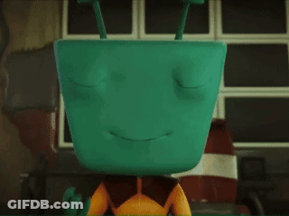 A Man Wearing Headphones With His Eyes Closed Smiles GIF