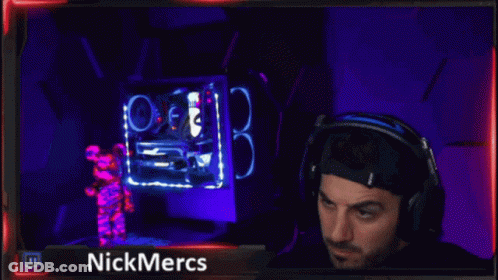 A Man Wearing Headphones With Nickmercs Written On The Bottom GIF