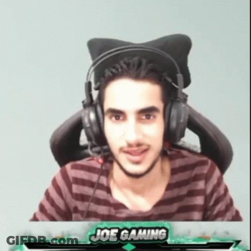 A Man Wearing Headphones With The Name Joe Gaming On The Bottom Of The Screen GIF