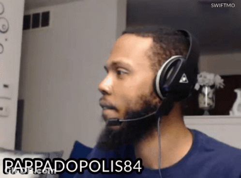 A Man Wearing Headphones With The Name Pappadopolis84 On The Bottom Right GIF