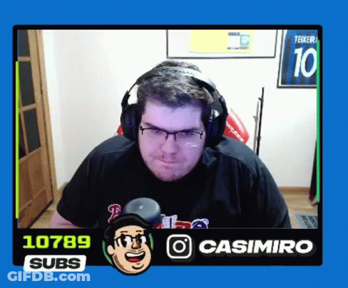 A Man Wearing Headphones With The Number 10 On The Back Of His Shirt GIF
