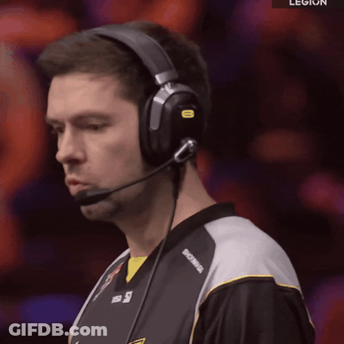 A Man Wearing Headphones With The Word Legion On The Bottom Right GIF
