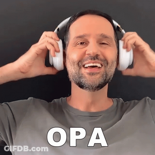 A Man Wearing Headphones With The Word Opa In White Letters GIF