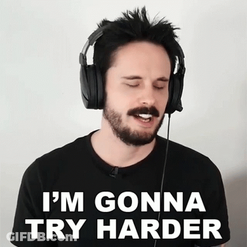 A Man Wearing Headphones With The Words I 'M Gonna Try Harder Below Him GIF