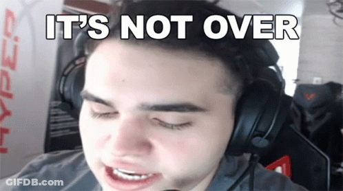A Man Wearing Headphones With The Words " It 'S Not Over " Above His Head GIF