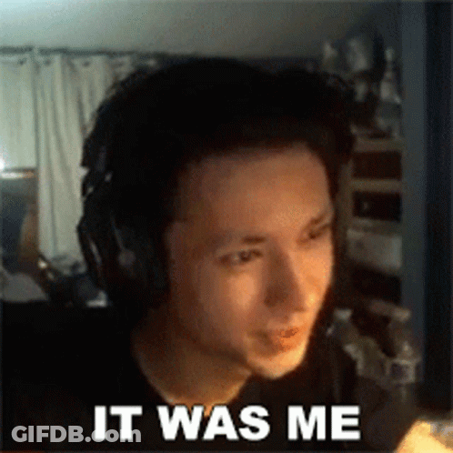 A Man Wearing Headphones With The Words It Was Me On His Face GIF