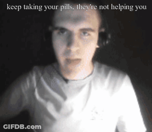 A Man Wearing Headphones With The Words Keep Taking Your Pills They 'Re Not Helping You Above Him GIF
