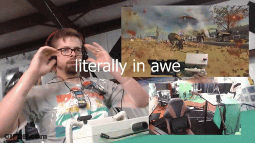 A Man Wearing Headphones With The Words Literally In Awe GIF