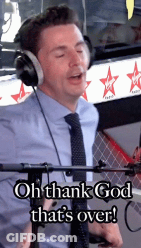 A Man Wearing Headphones With The Words Oh Thank God That 'S Over GIF