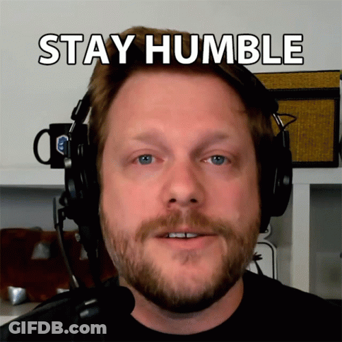 A Man Wearing Headphones With The Words Stay Humble Written Above Him GIF