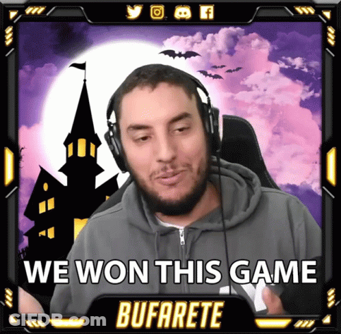 A Man Wearing Headphones With The Words " We Won This Game " Below Him GIF