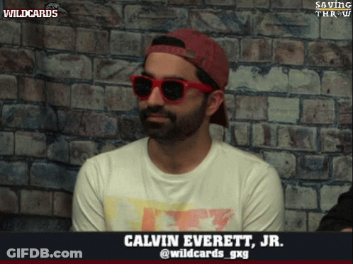 A Man Wearing Red Sunglasses And A Red Hat Is Named Calvin Everett Jr. GIF