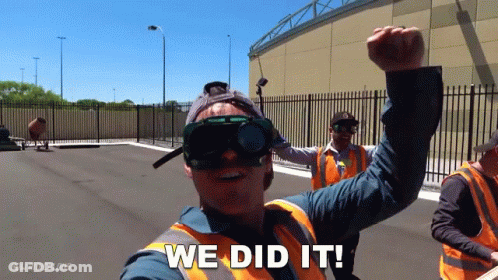 A Man Wearing Safety Vests And Goggles Says " We Did It " GIF