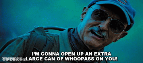 A Man Wearing Sunglasses And A Baseball Cap Says I 'M Gonna Open Up An Extra Large Can Of Whoopass On You GIF