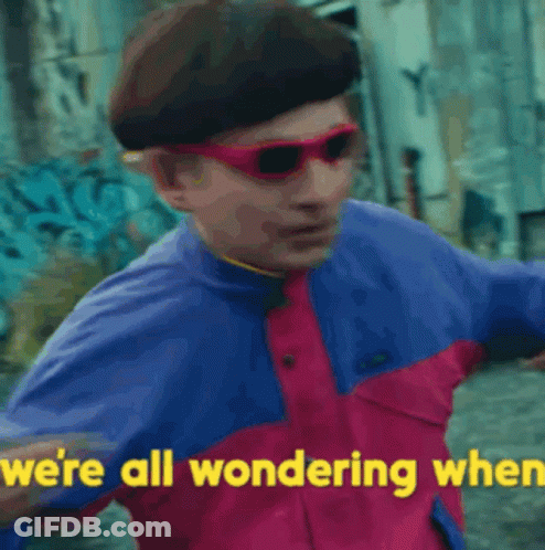 A Man Wearing Sunglasses And A Beret Says `` We 'Re All Wondering When '' GIF