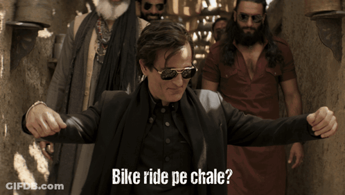 A Man Wearing Sunglasses And A Black Jacket With The Words Bike Ride Pe Chale GIF