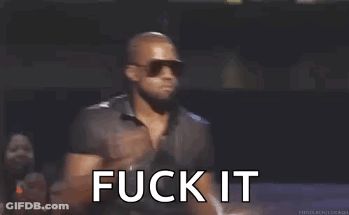 A Man Wearing Sunglasses And A Black Shirt Is Standing In Front Of A Microphone And Saying `` Fuck It '' . GIF