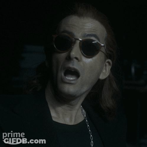 A Man Wearing Sunglasses And A Black Shirt Says " Not Yet " On The Bottom GIF