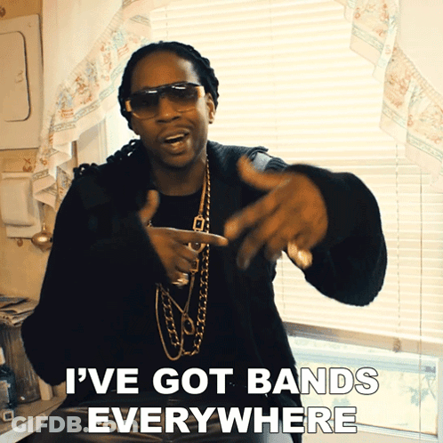 A Man Wearing Sunglasses And A Black Sweater Says " I 'Ve Got Bands Everywhere " GIF