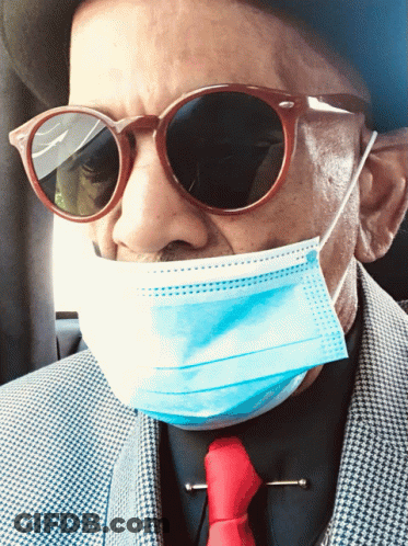 A Man Wearing Sunglasses And A Blue Mask GIF