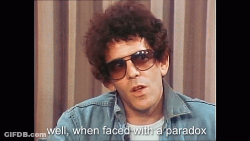 A Man Wearing Sunglasses And A Denim Jacket Is Talking About Well When Faced With A Paradox GIF