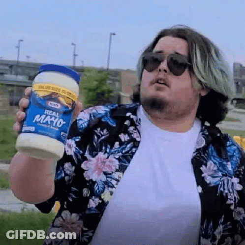 A Man Wearing Sunglasses And A Floral Shirt Is Holding A Jar Of Mayonnaise . GIF