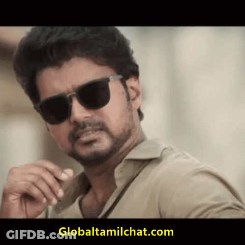 A Man Wearing Sunglasses And A Globaltamilchat.com Logo On The Bottom GIF