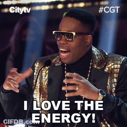 A Man Wearing Sunglasses And A Gold Jacket Says " I Love The Energy " GIF